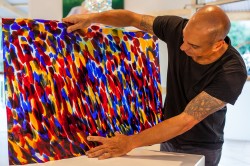 Asaf holding German glass LR